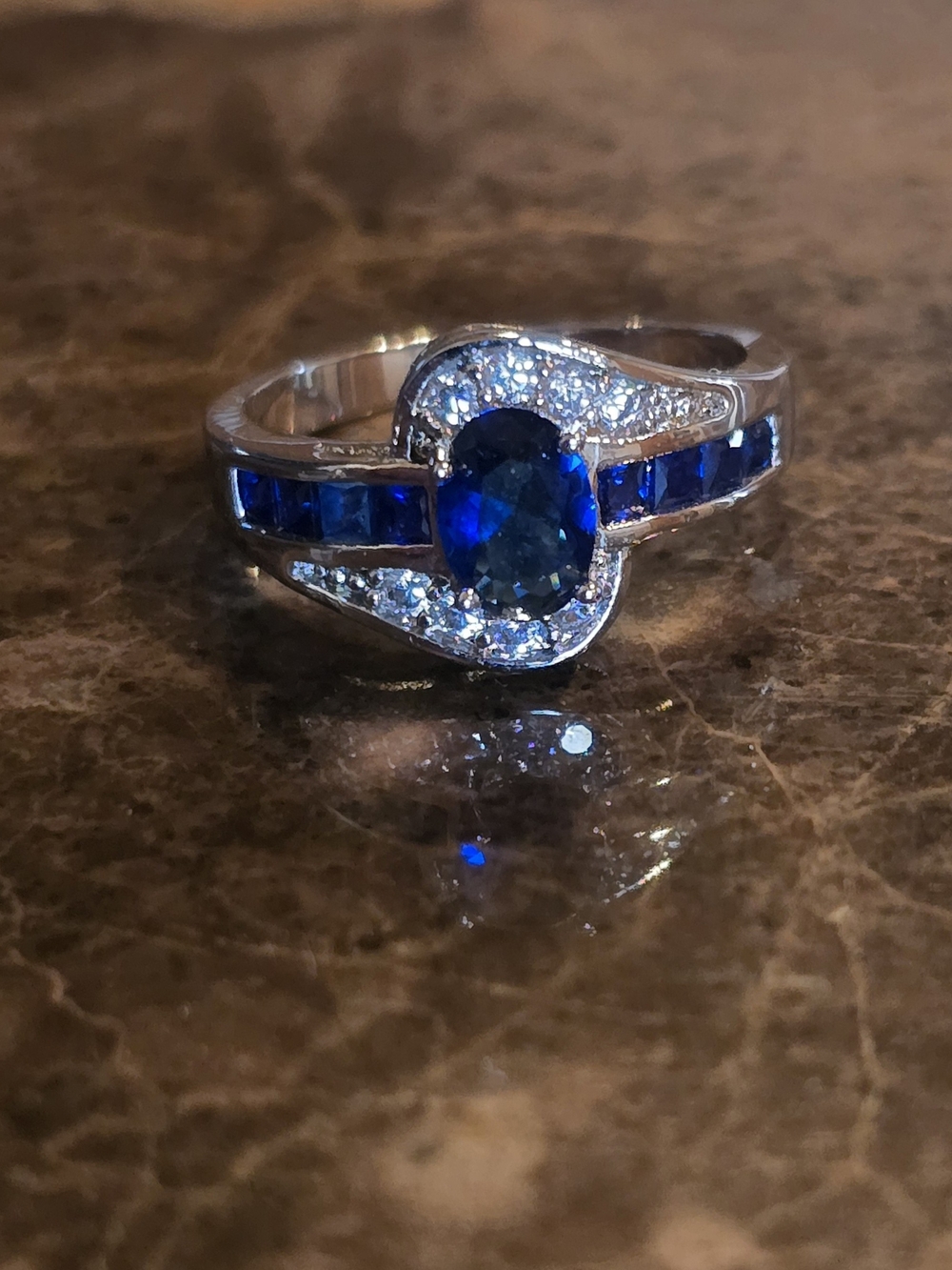 Blue Sapphire and Diamond Halo Women’s Ring - Blue